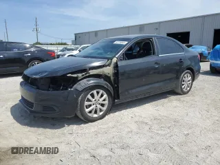 2013 Volkswagen Jetta SE with VIN 3VWDX7AJ7DM284871, listed as a Copart auction lot 53776665 with 180,147 mi miles and Salvage title. Bid and sale history available at DreamBid. Image 1.
