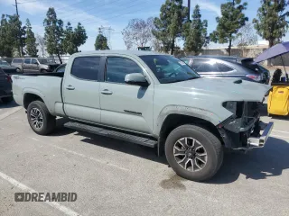 2022 Toyota Tacoma SR5 with VIN 3TMBZ5DN9NM033861, listed as a Copart auction lot 53704065 with 55,386 mi miles and Salvage title. Bid and sale history available at DreamBid. Image 4.