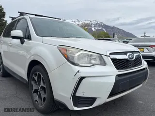 2014 Subaru Forester 2.0XT Premium with VIN JF2SJGDC1EH477436, listed as a Copart auction lot 54798465 with 124,807 mi miles and Clean Title. Bid and sale history available at carsss.com. Image 1.
