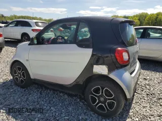 2019 Smart fortwo Pure z VIN WMEFJ9BAXKK359995, wystawiony jako Copart lot #56724955 z przebiegiem 17 755 mil mil oraz Tytuł czysty. Historia ofert i sprzedaży dostępna na DreamBid. Obrazek 2.