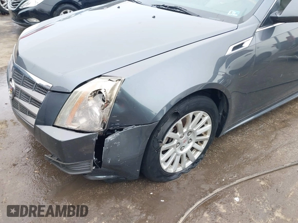 2011 Cadillac CTS Sedan Luxury with VIN 1G6DG5EY7B0163601, listed as a IAAI auction lot 41536256 with 106,523 mi miles. Bid and sale history available at carsss.com. Image 6.