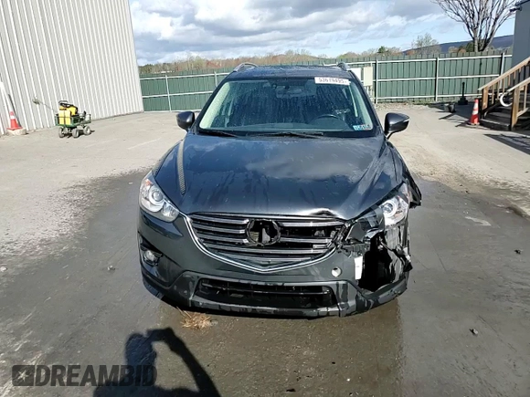 2016 Mazda CX-5 Grand Touring with VIN JM3KE4DY0G0679190, listed as a Copart auction lot 53619495 with 154,649 mi miles and Salvage Title. Bid and sale history available at carsss.com. Image 14.