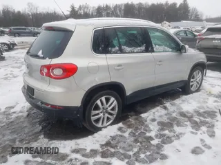 2011 Volkswagen Tiguan SE with VIN WVGBV7AX2BW513647, listed as a IAAI auction lot 41660772 with 86,042 mi miles and . Bid and sale history available at DreamBid. Image 4.