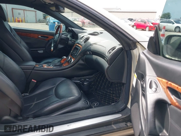 2003 Mercedes-Benz SL 500 z VIN WDBSK75F33F009204, wystawiony jako IAAI lot #42305205 z przebiegiem 87 108 mil mil oraz . Historia ofert i sprzedaży dostępna na DreamBid. Obrazek 5.