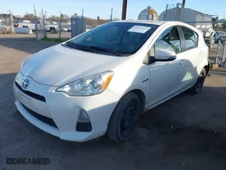 2014 Toyota Prius c One with VIN JTDKDTB35E1558028, listed as a IAAI auction lot 41635815 with 174,923 mi miles. Bid and sale history available at carsss.com. Image 18.
