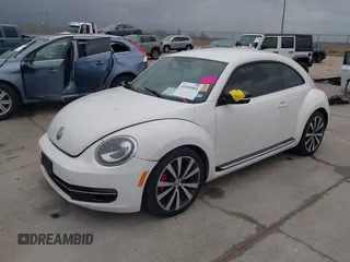 2012 Volkswagen Beetle Turbo with VIN 3VWVA7AT3CM650301, listed as a IAAI auction lot 41525503 with Not Provided miles and . Bid and sale history available at DreamBid. Image 2.