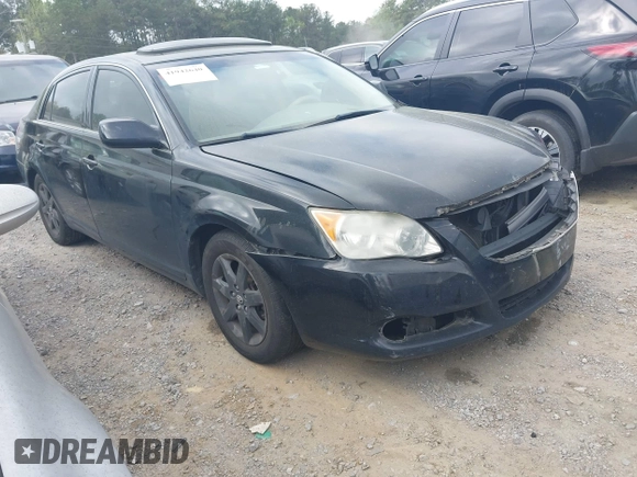 2010 Toyota Avalon XL with VIN 4T1BK3DB8AU358260, listed as a IAAI auction lot 41942640 with 230,584 mi miles and . Bid and sale history available at carsss.com. Image 1.