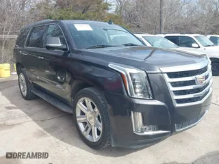 2015 Cadillac Escalade Luxury with VIN 1GYS3MKJ6FR643190, listed as a IAAI auction lot 41689594 with 134,682 mi miles. Bid and sale history available at carsss.com. Image 1.