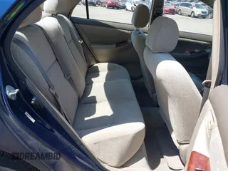 2003 Toyota Corolla CE with VIN 2T1BR32E43C007729, listed as a IAAI auction lot 42116057 with 167,012 mi miles and . Bid and sale history available at DreamBid. Image 8.