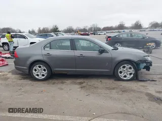 2011 Ford Fusion SE with VIN 3FAHP0HA7BR331095, listed as a IAAI auction lot 41911404 with 182,425 mi miles. Bid and sale history available at carsss.com. Image 14.