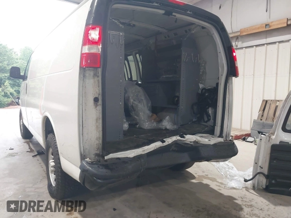 2021 Chevrolet Express Cargo with VIN 1GCWGAFP4M1160480, listed as a IAAI auction lot 42621437 with 99,142 mi miles and . Bid and sale history available at DreamBid. Image 6.