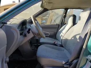 1996 Ford Aspire z VIN KNJLT06H0T6195551, wystawiony jako Copart lot #79450694 z przebiegiem 887 992 mil mil oraz Tytuł czysty. Historia ofert i sprzedaży dostępna na DreamBid. Obrazek 7.