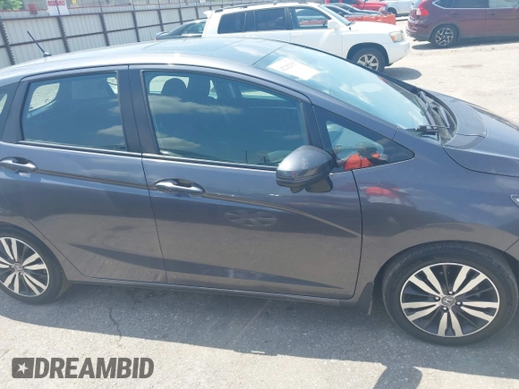 2015 Honda Fit EX-L with VIN 3HGGK5H80FM727081, listed as a IAAI auction lot 42232315 with 57,906 mi miles and . Bid and sale history available at DreamBid. Image 13.