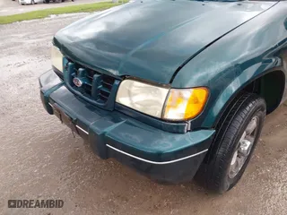 2000 Kia Sportage with VIN KNDJA7233Y5685000, listed as a IAAI auction lot 42005169 with 221,447 mi miles. Bid and sale history available at carsss.com. Image 6.