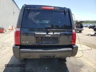 2009 Jeep Commander Sport z VIN 1J8HG48K99C551852, wystawiony jako Copart lot #55077775 z przebiegiem 157 829 mil mil oraz Szkoda całkowita • Salvage title. Historia ofert i sprzedaży dostępna na DreamBid. Obrazek 6.
