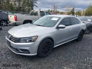 2016 Volkswagen Passat 1.8T R-Line with VIN 1VWAT7A30GC039285, listed as a IAAI auction lot 41642546 with 177,890 mi miles. Bid and sale history available at carsss.com. Image 2.