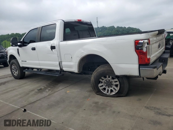 2019 Ford F-250 XL with VIN 1FT7W2BT9KED08872, listed as a Copart auction lot 64000735 with 89,099 mi miles and Salvage title. Bid and sale history available at DreamBid. Image 2.