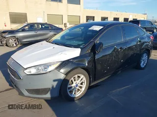 2015 Ford Focus SE with VIN 1FADP3F29FL350473, listed as a IAAI auction lot 41032182 with 102,898 mi miles. Bid and sale history available at carsss.com. Image 18.