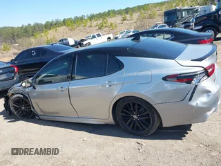 2022 Toyota Camry TRD with VIN 4T1KZ1AK8NU061810, listed as a IAAI auction lot 41769584 with 79,709 mi miles and . Bid and sale history available at DreamBid. Image 14.