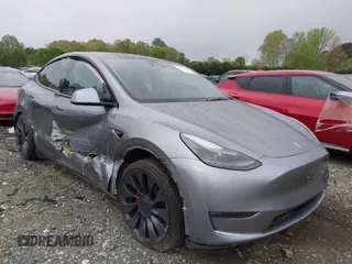 2024 Tesla Model Y Performance with VIN 7SAYGDEF2RA322351, listed as a IAAI auction lot 41953896 with 8,959 mi miles and . Bid and sale history available at carsss.com. Image 1.