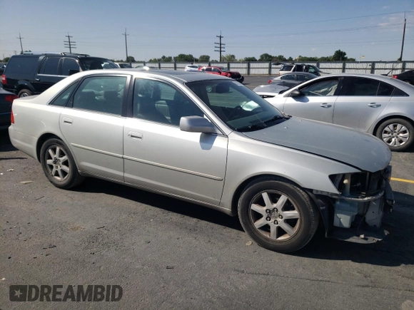 2000 Toyota Avalon XL with VIN 4T1BF28B7YU112576, listed as a Copart auction lot 59726505 with 242,412 mi miles and Salvage title. Bid and sale history available at DreamBid. Image 4.