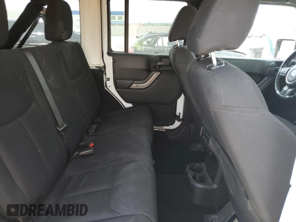 2015 Jeep Wrangler Unlimited Sport with VIN 1C4BJWDG2FL545561, listed as a Copart auction lot 60574045 with 83,592 mi miles and Salvage title. Bid and sale history available at DreamBid. Image 11.