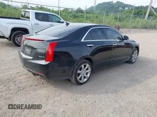 2014 Cadillac ATS Luxury AWD with VIN 1G6AH5RX2E0119821, listed as a IAAI auction lot 42670758 with 157,925 mi miles and . Bid and sale history available at DreamBid. Image 4.