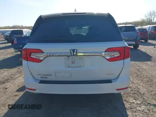2020 Honda Odyssey Elite with VIN 5FNRL6H92LB014671, listed as a IAAI auction lot 42110389 with 104,180 mi miles and . Bid and sale history available at DreamBid. Image 16.
