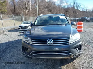 2016 Volkswagen Touareg Sport with VIN WVGEF9BP2GD005315, listed as a IAAI auction lot 41588590 with 134,709 mi miles and . Bid and sale history available at DreamBid. Image 12.