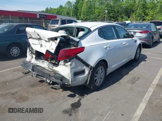2013 Kia Optima LX z VIN KNAGM4A7XD5374109, wystawiony jako IAAI lot #42209534 z przebiegiem 184 578 mil mil oraz . Historia ofert i sprzedaży dostępna na DreamBid. Obrazek 4.