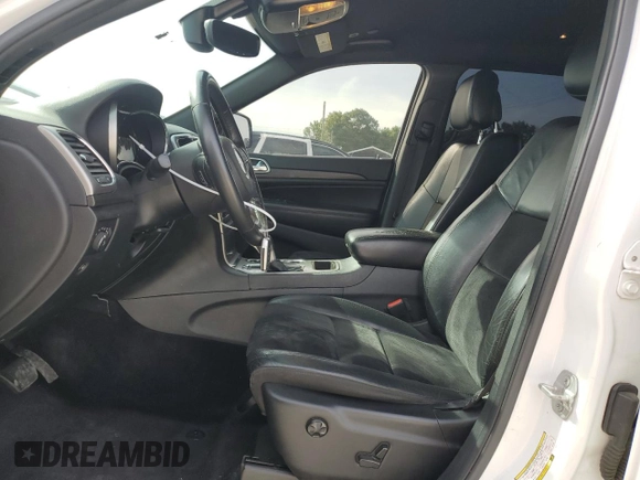 2018 Jeep Grand Cherokee Laredo E with VIN 1C4RJFAG3JC214922, listed as a Copart auction lot 56583955 with 133,643 mi miles and Clean Title. Bid and sale history available at DreamBid. Image 7.