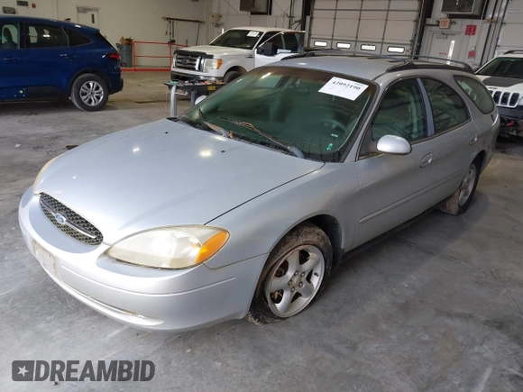 2001 Ford Taurus SE Standard with VIN 1FAFP58U91G202523, listed as a IAAI auction lot 42092190 with 197,961 mi miles. Bid and sale history available at carsss.com. Image 2.