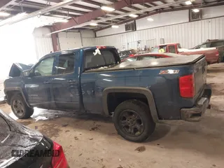 2016 Chevrolet Silverado 1500 LT with VIN 1GCVKREC5GZ296369, listed as a IAAI auction lot 41262302 with 122,859 mi miles. Bid and sale history available at carsss.com. Image 14.