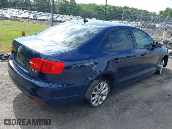 2012 Volkswagen Jetta SE with VIN 3VWDX7AJ1CM389470, listed as a IAAI auction lot 41011343 with 133,295 mi miles and . Bid and sale history available at DreamBid. Image 4.