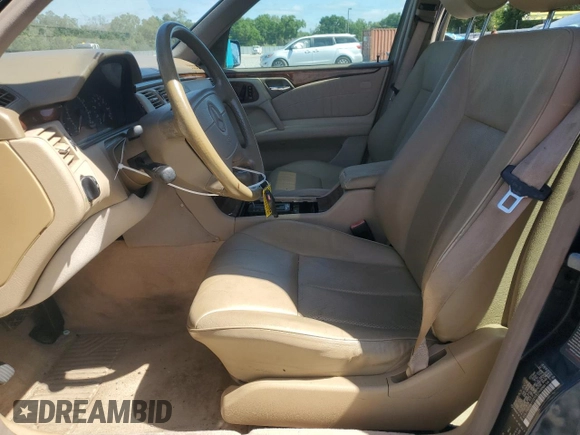 1998 Mercedes-Benz E with VIN WDBJF82F4WX012153, listed as a Copart auction lot 51848665 with 121,867 mi miles and Salvage Title. Bid and sale history available at DreamBid. Image 7.