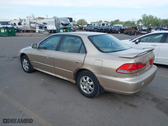 2002 Honda Accord Sdn EX with VIN 1HGCG56602A058660, listed as a IAAI auction lot 42117269 with 179,405 mi miles. Bid and sale history available at carsss.com. Image 3.