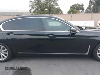 2022 BMW 7 Series 740i with VIN WBA7T2C0XNCJ31291, listed as a IAAI auction lot 40623307 with 98,877 mi miles. Bid and sale history available at carsss.com. Image 13.