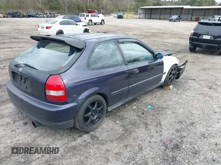 1997 Honda Civic DX with VIN 2HGEJ6346VH103531, listed as a IAAI auction lot 41867471 with 213,760 mi miles and . Bid and sale history available at DreamBid. Image 4.