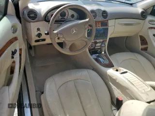 2006 Mercedes-Benz CLK 500 with VIN WDBTJ75J16F195745, listed as a Copart auction lot 56946894 with 239,874 mi miles and Salvage Title. Bid and sale history available at carsss.com. Image 8.