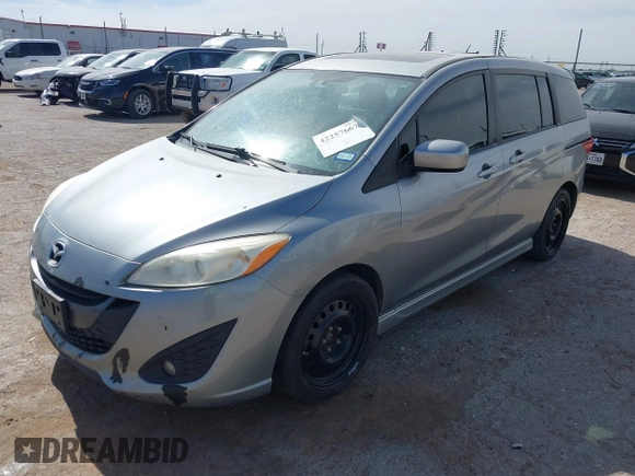 2012 Mazda 5 Grand Touring with VIN JM1CW2DL4C0109772, listed as a IAAI auction lot 42257667 with 161,207 mi miles and . Bid and sale history available at DreamBid. Image 2.