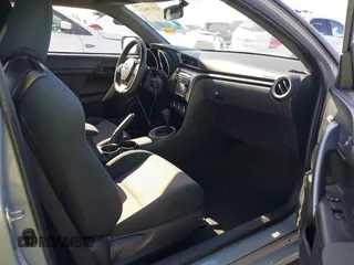 2015 Scion tC with VIN JTKJF5C7XFJ012872, listed as a IAAI auction lot 42128621 with 100,832 mi miles. Bid and sale history available at carsss.com. Image 5.