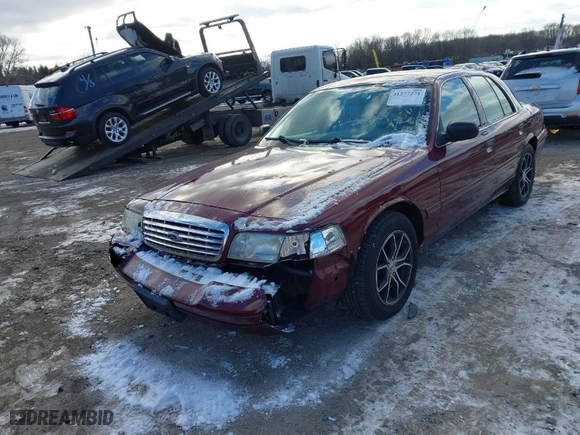 2004 Ford Crown Victoria Standard with VIN 2FAFP73W74X150232, listed as a IAAI auction lot 41277271 with 146,518 mi miles. Bid and sale history available at carsss.com. Image 2.