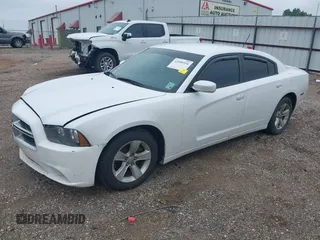 2014 Dodge Charger SE with VIN 2C3CDXBG5EH277920, listed as a IAAI auction lot 42109354 with 146,615 mi miles and . Bid and sale history available at carsss.com. Image 23.