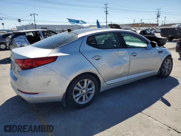 2013 Kia Optima EX with VIN 5XXGN4A73DG196135, listed as a Copart auction lot 62788485 with 137,812 mi miles and Salvage title. Bid and sale history available at DreamBid. Image 3.