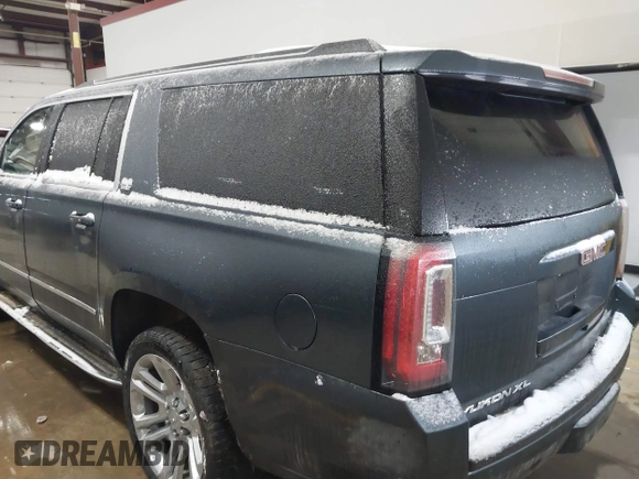 2019 GMC Yukon XL SLT with VIN 1GKS2GKC5KR137005, listed as a IAAI auction lot 41435370 with 125,453 mi miles and . Bid and sale history available at carsss.com. Image 3.