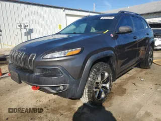 2014 Jeep Cherokee Trailhawk with VIN 1C4PJMBS1EW161642, listed as a Copart auction lot 46672345 with 196,908 mi miles and Salvage Title. Bid and sale history available at carsss.com. Image 1.