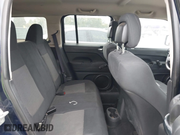 2012 Jeep Patriot Sport with VIN 1C4NJRBB4CD659072, listed as a IAAI auction lot 40584115 with 183,672 mi miles. Bid and sale history available at carsss.com. Image 8.