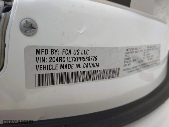 2023 Chrysler Pacifica Hybrid Touring L with VIN 2C4RC1L7XPR588776, listed as a IAAI auction lot 41344136 with 47,165 mi miles. Bid and sale history available at carsss.com. Image 9.