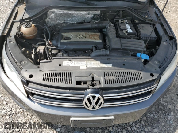 2012 Volkswagen Tiguan SE z VIN WVGAV7AX5CW004889, wystawiony jako Copart lot #57346115 z przebiegiem 100 503 mil mil oraz Szkoda całkowita • Salvage title. Historia ofert i sprzedaży dostępna na DreamBid. Obrazek 12.