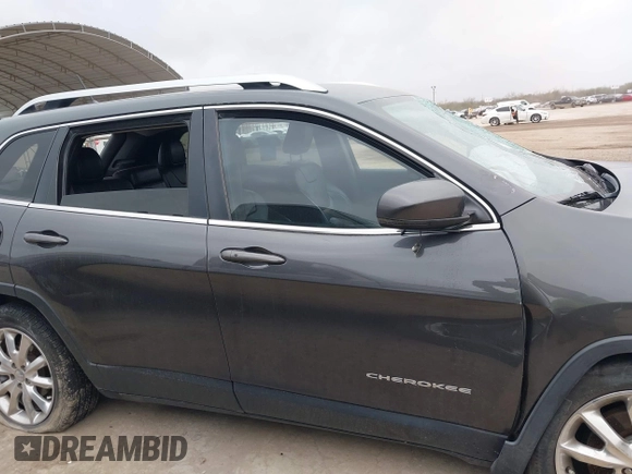 2015 Jeep Cherokee Limited with VIN 1C4PJLDB1FW708157, listed as a IAAI auction lot 41502567 with 85,354 mi miles and . Bid and sale history available at DreamBid. Image 14.